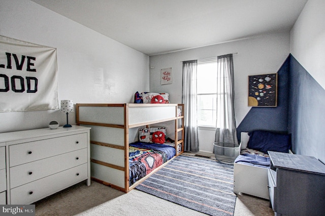 bedroom with light carpet