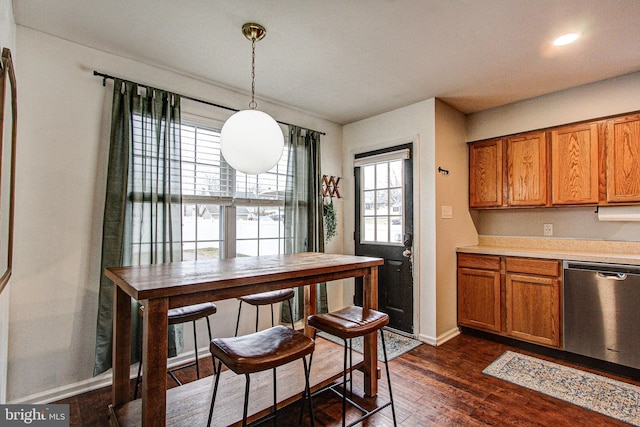 dining space featuring dark hardwood / wood-style flooring