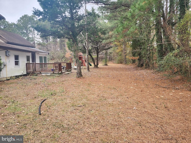 view of yard with a deck