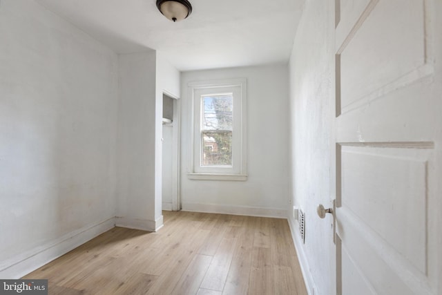 empty room featuring light hardwood / wood-style floors