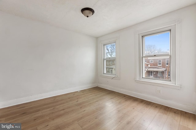 empty room featuring light hardwood / wood-style floors