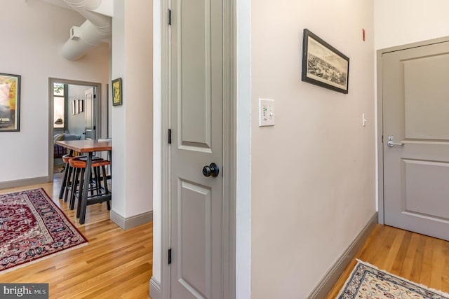 hall featuring light hardwood / wood-style floors