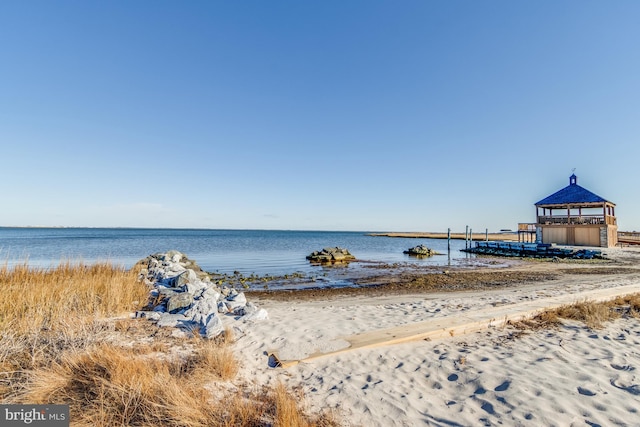 property view of water with a beach view