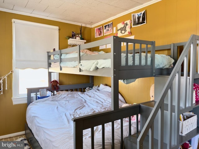 bedroom featuring ornamental molding