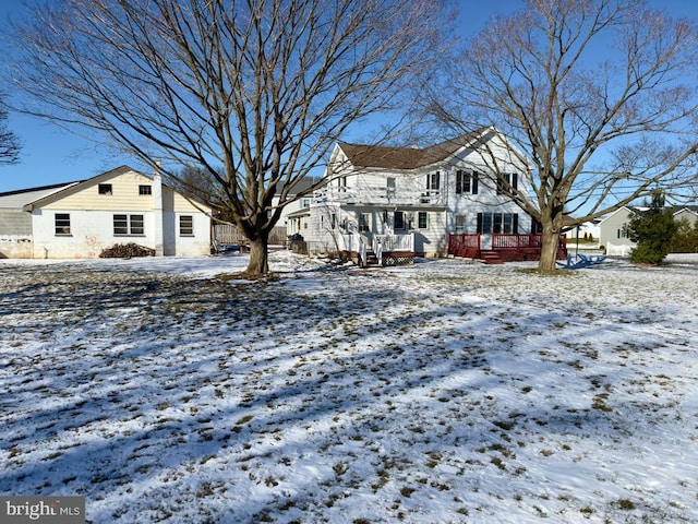 view of snow covered property