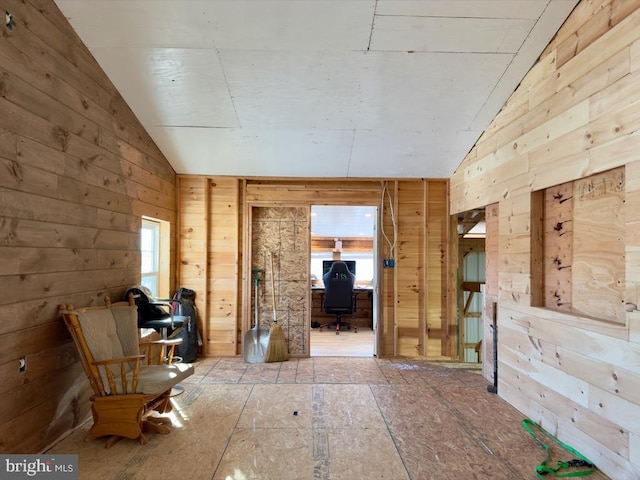 hall with lofted ceiling