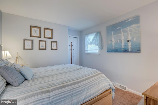 bedroom featuring carpet