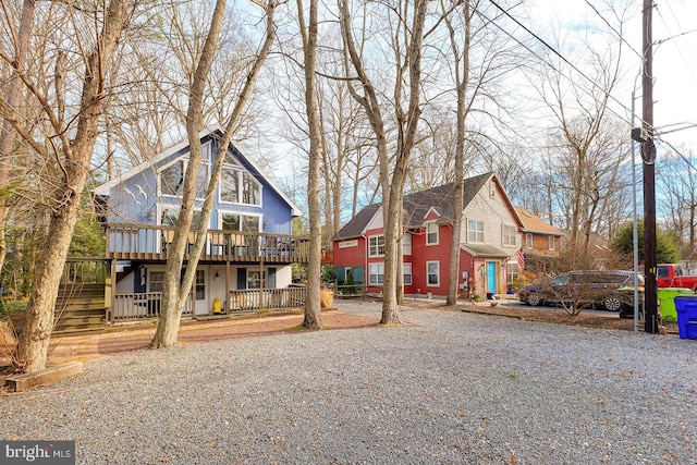 view of front of house featuring a wooden deck