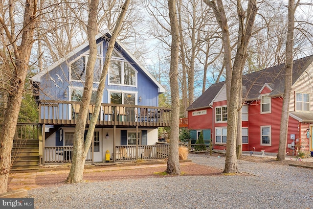 view of front of property with a wooden deck