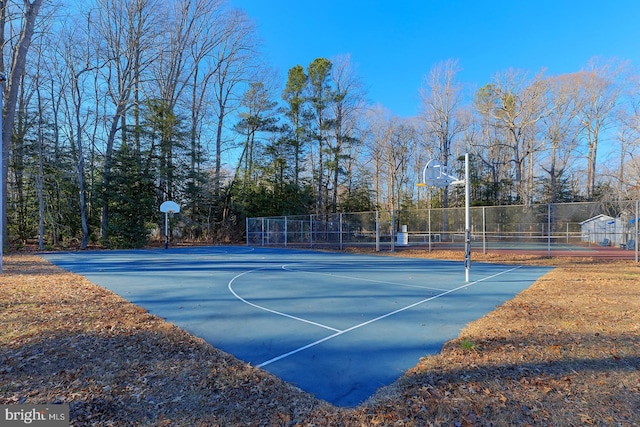 view of sport court featuring tennis court