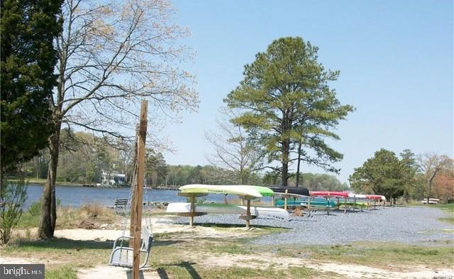 view of home's community with a water view