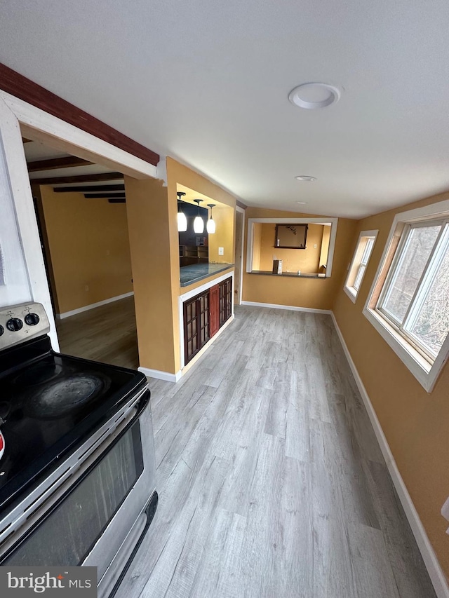 unfurnished living room featuring light wood-type flooring