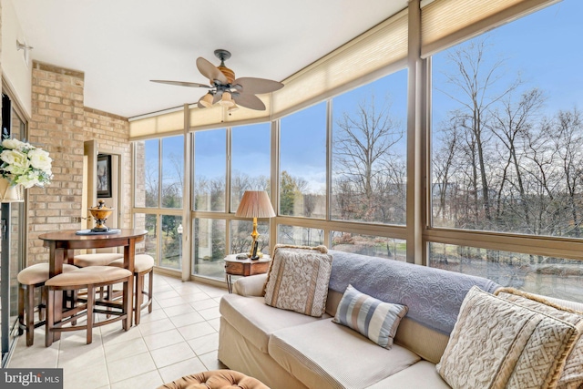 sunroom / solarium with ceiling fan