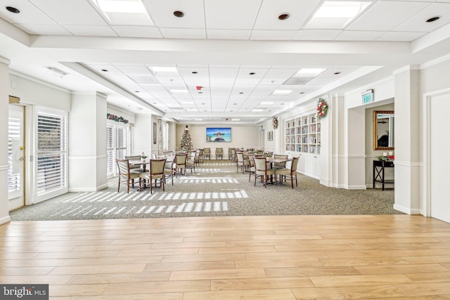 dining room with a paneled ceiling