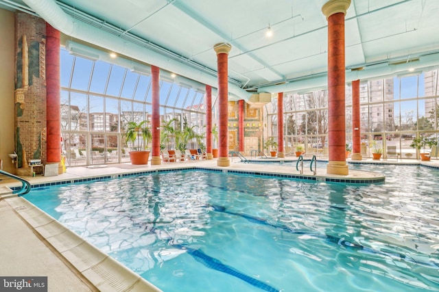 view of pool with a lanai