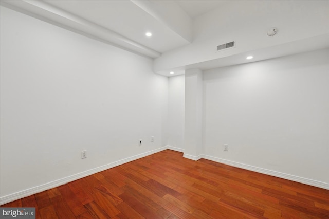 empty room featuring hardwood / wood-style flooring