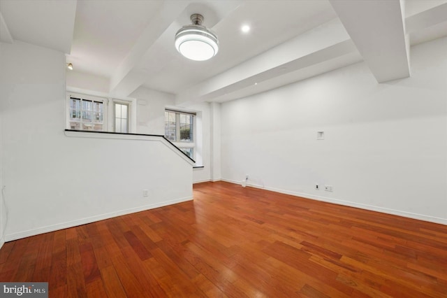 unfurnished living room with hardwood / wood-style flooring