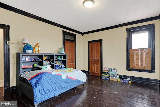 bedroom with wood-type flooring and ornamental molding