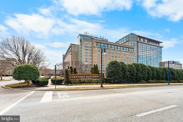 view of property featuring uncovered parking