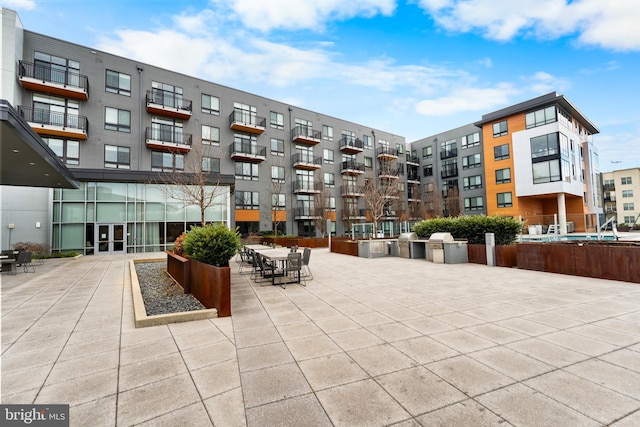 surrounding community featuring a patio area