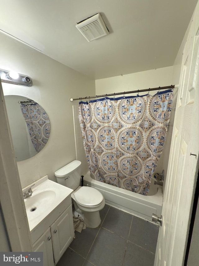 full bathroom with tile patterned flooring, vanity, toilet, and shower / tub combo