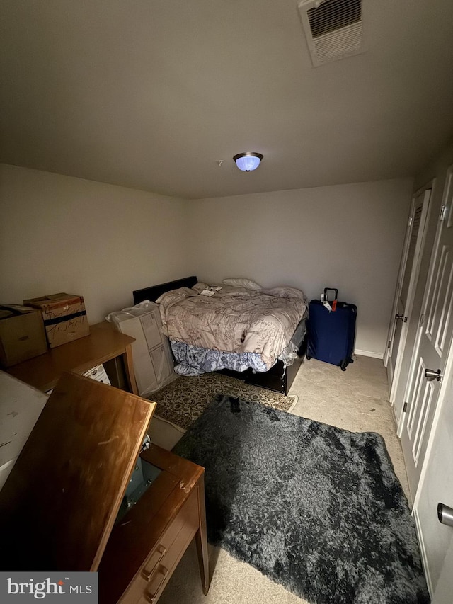 bedroom featuring carpet