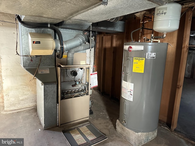 utility room featuring heating unit and water heater