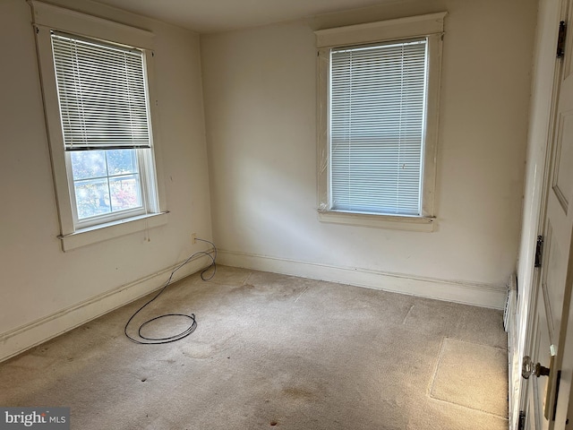 view of carpeted spare room