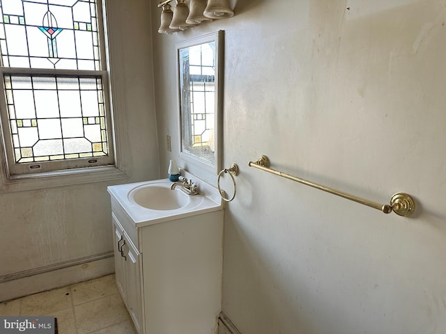 bathroom featuring tile patterned floors and vanity