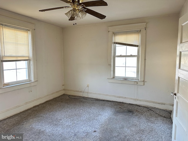 unfurnished room with ceiling fan