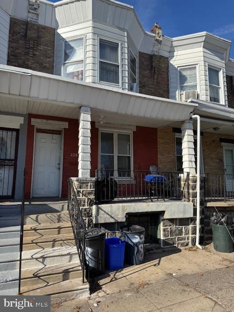 doorway to property featuring covered porch