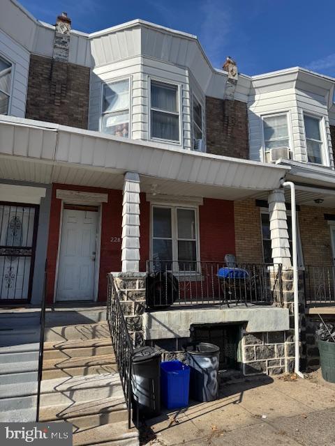 entrance to property with covered porch