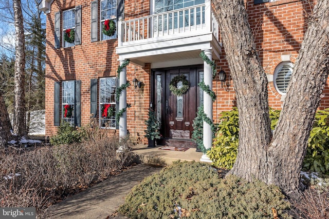 doorway to property with a balcony