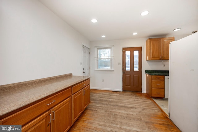 kitchen with light hardwood / wood-style flooring