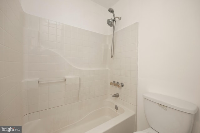 bathroom featuring toilet and bathtub / shower combination