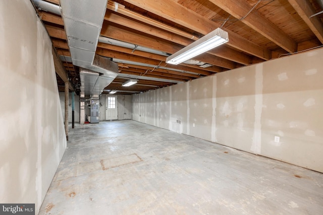 basement featuring heating unit