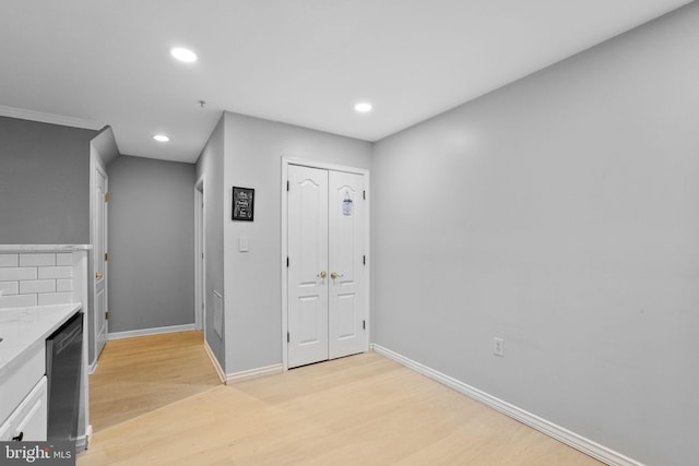 corridor featuring light hardwood / wood-style flooring