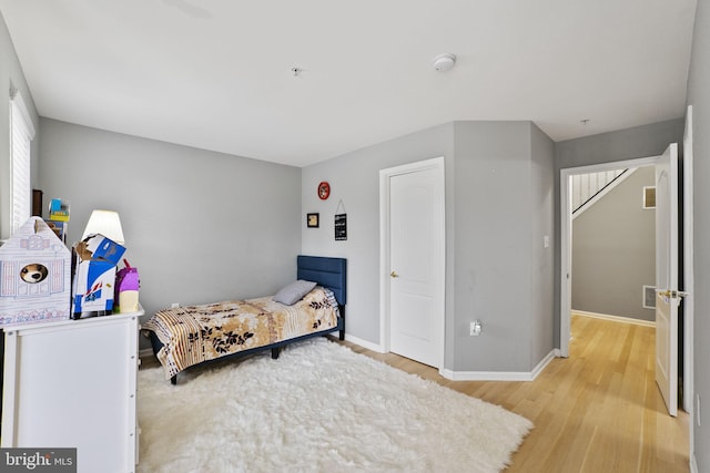 bedroom featuring light hardwood / wood-style flooring