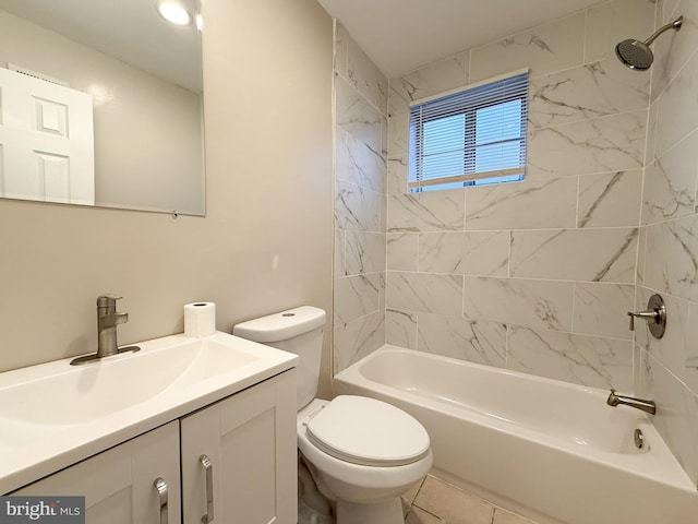 full bathroom featuring vanity, tiled shower / bath combo, and toilet