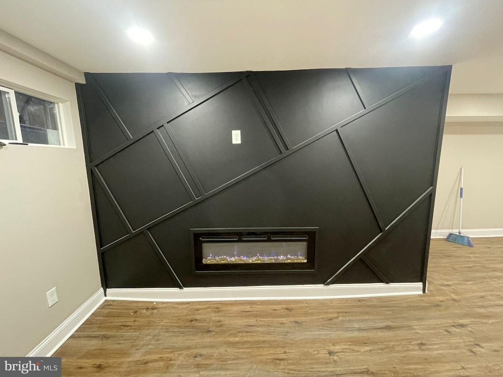 interior details with hardwood / wood-style flooring