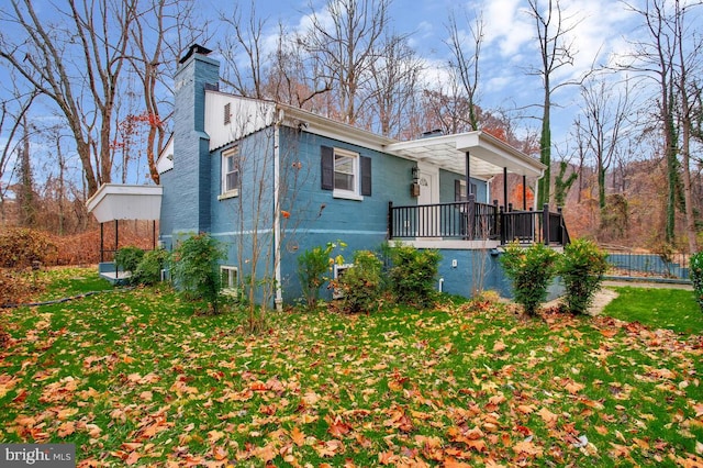 view of home's exterior with a lawn