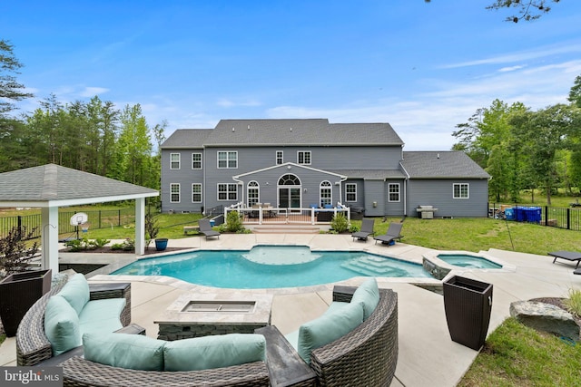 13853 Bluestone Ct, Hughesville, MD 20637 - view of pool featuring a deck, an in-ground hot tub, an outdoor living space with a fire pit, a gazebo, and a patio