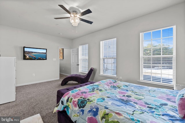 bedroom with ceiling fan and carpet