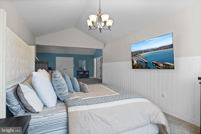 carpeted bedroom featuring a notable chandelier, lofted ceiling, and wooden walls