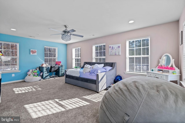 carpeted bedroom featuring ceiling fan