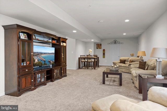 living room with light colored carpet