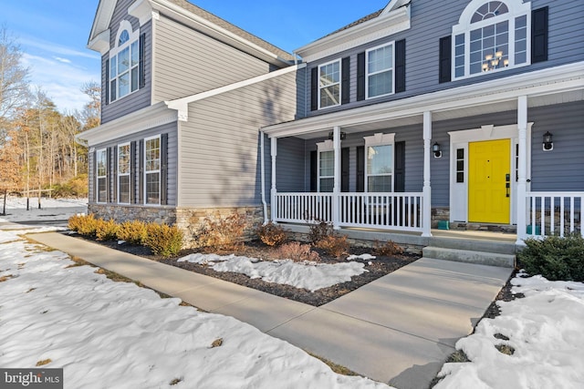 view of front of property featuring covered porch