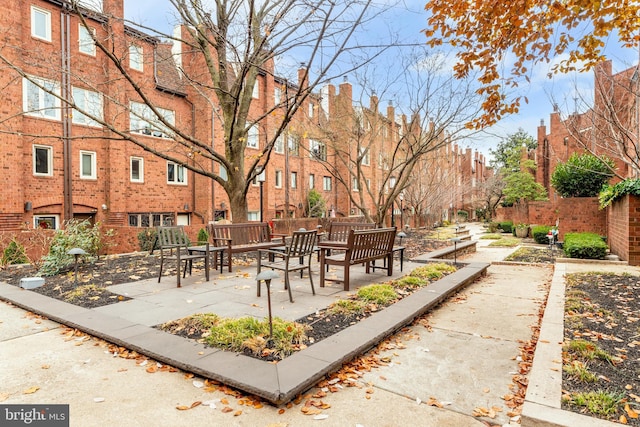 surrounding community featuring a patio area