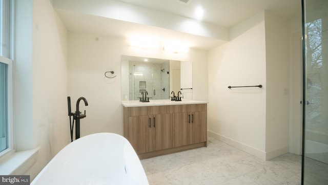 bathroom with vanity and independent shower and bath