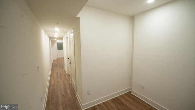 hall featuring dark hardwood / wood-style floors